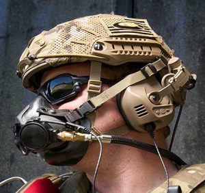 Airborne Systems Parachute Oxygen Mask for Military - SOLR™ SOLR™ military parachute oxygen mask for army jumpers. Compatible with the new SOLR™ & legacy PHAOS & PHANTOM Bailout Bottles. Soldier with oxygen mask and geared up. Side view face.